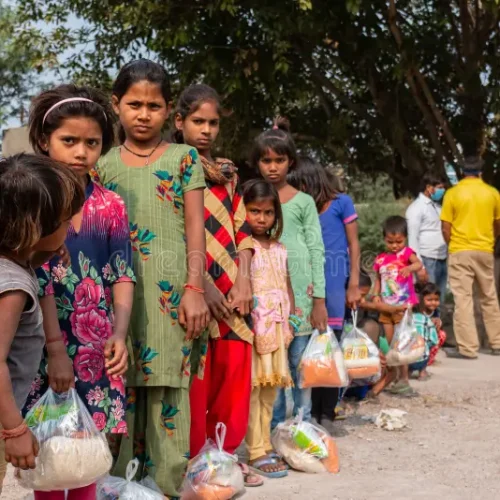 indian-young-students-village-slum-area-noida-uttar-pradesh-india-november-group-people-ngo-distributing-food-to-203882354
